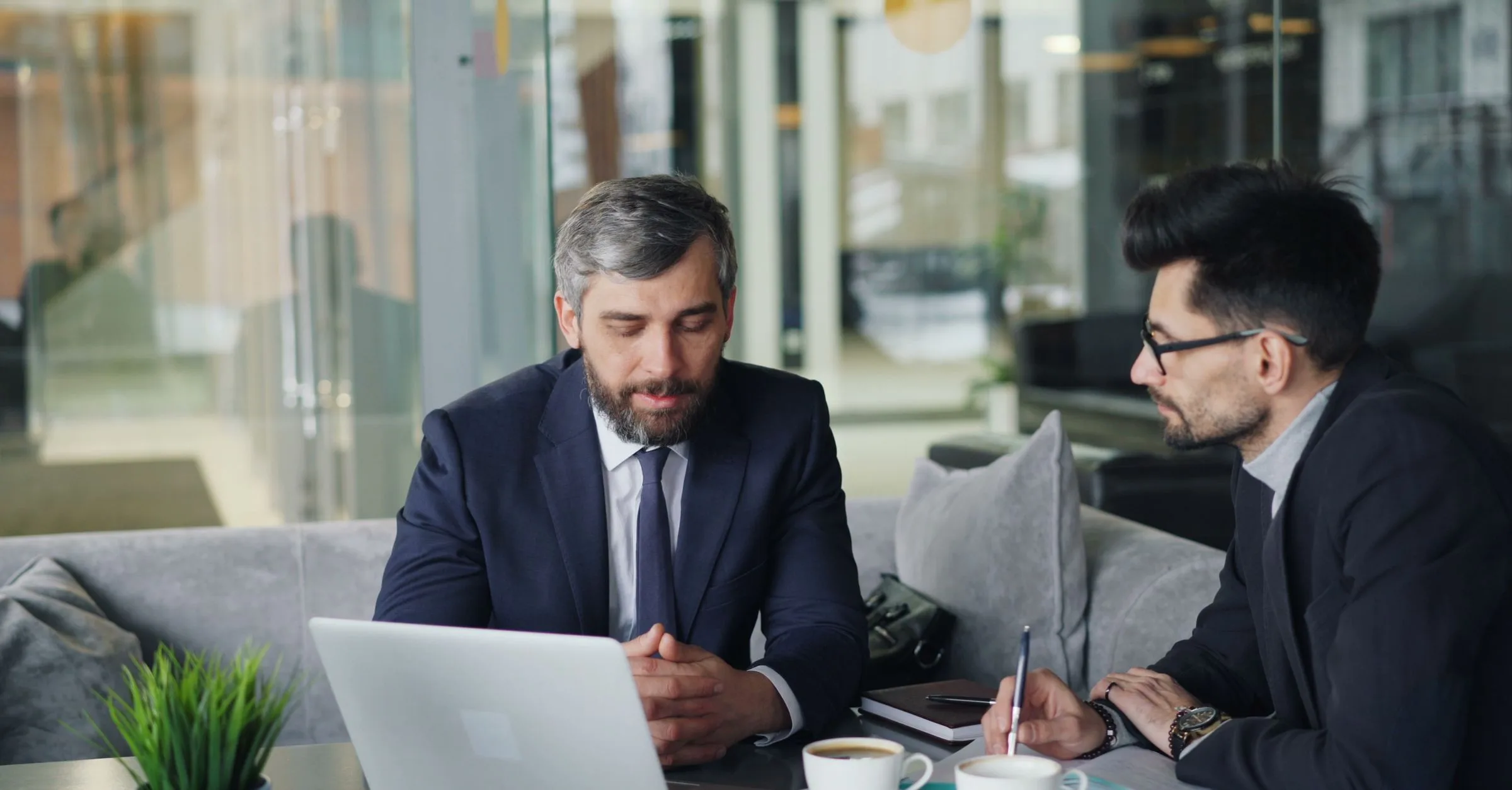 B2B consultants reviewing their lead pipeline between client meetings