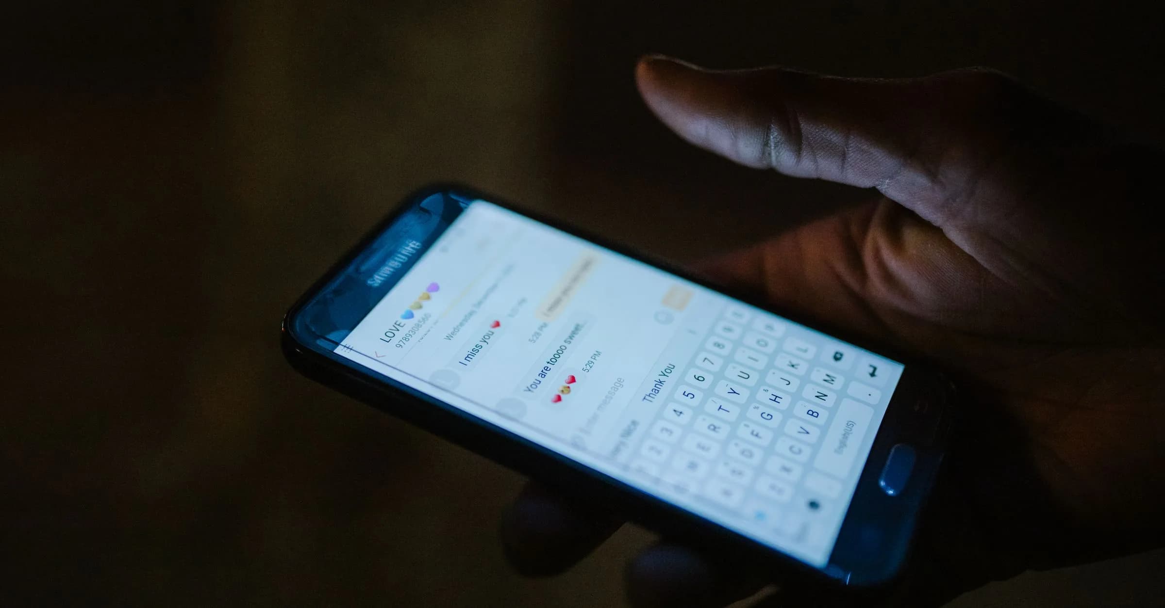 Sales agent replying to a lead on WhatsApp from a phone